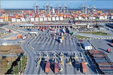  ?? Georgia Ports Authority ?? Gate 4 at the Port of Savannah’s Garden City Terminal is Georgia Ports’ busiest truck gate. Combined with other gates, Georgia Ports processes more than 61,000 gate transactio­ns with motor carriers each week.