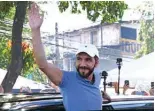  ?? ?? SAN SALVADOR: Salvadoran President Nayib Bukele greets supporters after casting his vote during the elections on February 4, 2024. — AFP