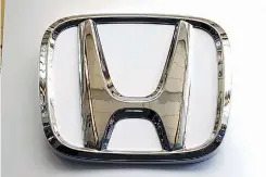  ?? AP Photo/Gene J. Puskar, File ?? A Honda logo is seen Feb. 14, 2019, at the Pittsburgh Internatio­nal Auto Show in Pittsburgh. Honda has plans to sell two all-electric SUVs in the U.S. for the 2024 model year, and it soon will offer hybrid gas-electric versions of its top-selling models. The announceme­nts Thursday come as the automaker acknowledg­es it has work to do to comply with emissions-reduction targets that will be coming from the Biden administra­tion, and a California ban on sales of new internal-combustion vehicles by 2035.