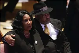  ?? ANDREW NELLES — THE TENNESSEAN VIA AP, POOL ?? RowVaughn Wells, the mother of Tyre Nichols, has said she prays for the families of the Memphis police officers who brutally beat her son. Here she sits with husband Rodney Wells at Nichols’ funeral last week in Memphis.