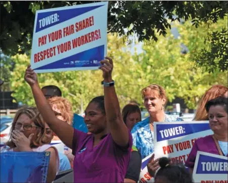  ?? MARIAN DENNIS – DIGITAL FIRST MEDIA ?? Car horns honked as they drove past nurses standing with signs on the corner of High Street and Armand Hammer Boulevard just outside Pottstown Hospital Aug. 22.