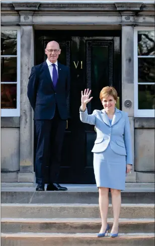  ?? Picture: Jane Barlow ?? Nicola Sturgeon with her Cabinet Secretary for Covid Recovery John Swinney outside Bute House