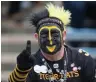  ?? TODD KOROL THE CANADIAN PRESS ?? A Hamilton Tiger-Cats football fan is seen during the 107th Grey Cup in Calgary, Alta., in 2019.