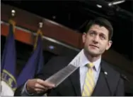  ?? THE ASSOCIATED PRESS ?? House Speaker Paul Ryan of Wis. holds his copy of insurance premium statistics Jan. 5 during a news conference on Capitol Hill in Washington.
