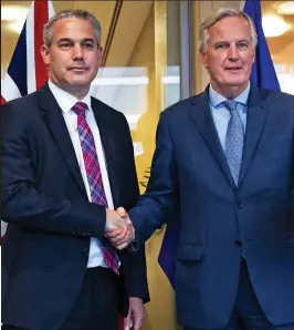  ??  ?? Greetings: Brexit Secretary Stephen Barclay, left, is welcomed by EU negotiator Michel Barnier yesterday