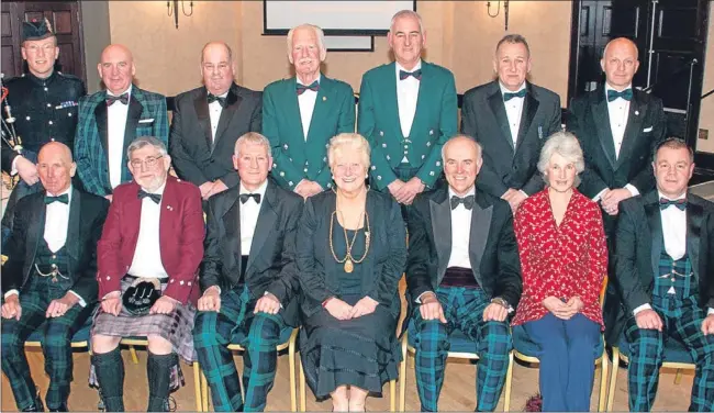  ?? Picture: Angus Findlay Photograph­y. ?? Perth Provost Liz Grant, centre, joins members of the Perth branch of The Black Watch Associatio­n for its annual Burns supper in the Salutation Hotel. She is flanked by chairman Capt Alan McEwen, left, and president Lt Col (Rtd) Roddy Riddell.