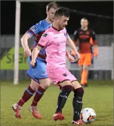  ??  ?? Thomas Croke on the ball as Luke Gallagher keeps a close watch.