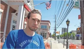  ?? MARY ALTAFFER/AP ?? In Staten Island, N.Y., college student Joseph Amodeo likens President Donald Trump to a pilot: If he goes down, the nation goes with him.