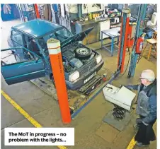  ??  ?? The MoT in progress – no problem with the lights…