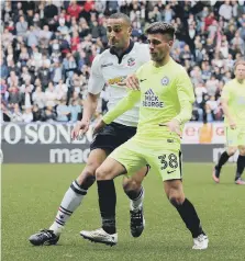  ??  ?? Andrea Borg in action for Posh at Bolton last season.