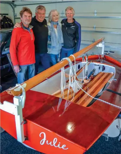  ??  ?? RIGHT Conspirato­rs Don Currie (left) and Graham Reid (far right) found and restored Julie for Mark Cole (second left). Mum Sally was there when the boat was first acquired by her husband-to-be.