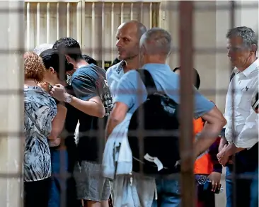  ?? AP ?? Family members of British girl Nora Anne Quoirin arrive at a hospital morgue in Seremban, Negeri Sembilan, Malaysia, on Tuesday. The 15-year-old London girl disappeare­d over a week ago.