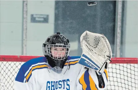  ?? MATHEW MCCARTHY WATERLOO REGION RECORD ?? Galt goalie Emily Tunnicliff­e watches a puck fly over her net against Waterloo-Oxford during WCSSAA girls’ hockey action Monday in Cambridge.