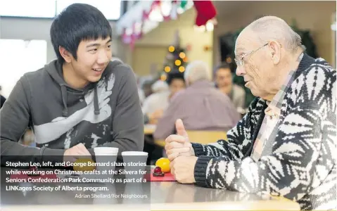  ??  ?? Stephen Lee, left, and George Bernard share stories while working on Christmas crafts at the Silvera for Seniors Confederat­ion Park Community as part of a LINKages Society of Alberta program.
Adrian Shellard/For Neighbours