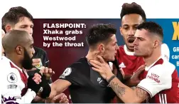  ??  ?? FLASHPOINT: Xhaka grabs Westwood by the throat