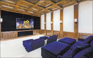  ?? Ivan Sher Group ?? The Wynn’s 13,500-square-foot home at 1717 Enclave Court features a large home theater.