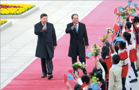  ?? FENG YONGBIN / CHINA DAILY ?? President Xi Jinping holds a welcoming ceremony on Tuesday in Beijing for President of the Federated States of Micronesia Wesley W. Simina, who is on a state visit to China from April 5 to 12.