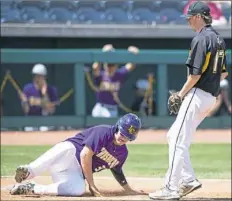  ??  ?? Lancaster Catholic’s Devon Atkinson slides home in front of South Side Beaver pitcher Casey Jones.