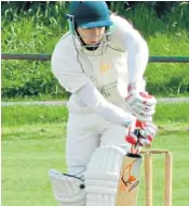  ??  ?? Declan Redwood, right with his father Phillip, and left as a batsman, outed himself as the bowler who denied a century to Jay Darrell, bottom, by hurling the ball over the boundary rope after the incident sparked outrage on social media