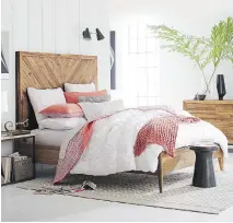  ?? WEST ELM
PHOTO COURTESY OF ?? The Alexa bed from West Elm looks to nature for inspiratio­n, with a solid wood frame offset by mostly white linen which benefits from a pop of colour in the coral-coloured cushions and coverlets.