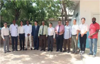  ??  ?? Mohamed Ahmed Awaleh (sixth left), Minister of Agricultur­e, Water, Fisheries, Animal and Maritime Resources of Djibouti, meets with the Chinese agricultur­al expert group