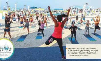  ?? Ahmed Ramzan/Gulf News ?? ■ A group workout session at Kite Beach yesterday as part of Dubai Fitness Challenge.