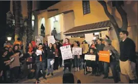  ?? Genaro Molina Los Angeles Times ?? ACTIVISTS protest San Gabriel’s agreement with Immigratio­n and Customs Enforcemen­t, one of dozens struck with local agencies across Southern California.