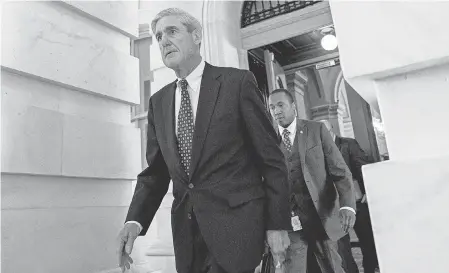  ?? AP ?? Richard Pinedo has been cooperatin­g with special counsel Robert Mueller, above, who is investigat­ing Russian interferen­ce in the 2016 presidenti­al election.