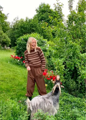  ??  ?? JUMPER, £375; TROUSERS, £445, both Max Mara. WELLIES, model’s own
MODEL Caroline at Stockholms­gruppen Models