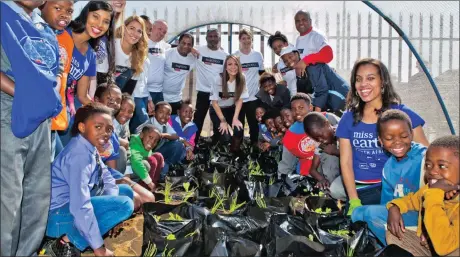  ?? Picture: CINDY ELLIS ?? MAKING AN IMPACT: The Miss Earth SA Finalists planting vegetables with teams from Pikitup, Tsogo Sun and Nedbank at Lulama School in Pimville, Soweto, to enhance the school’s food security programme and feeding scheme.