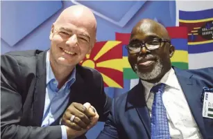  ??  ?? FIFA president, Ifantino (L) and re-elected NFF president, Amaju Pinnick in a warm handshake