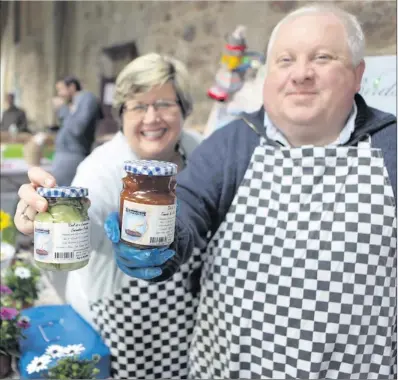  ??  ?? Olive and Pat Germaine of ‘The Birds and the Teas’ with some of their produce at the Kilruddery Market.