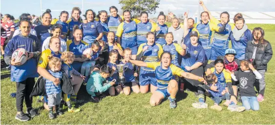  ?? Photo / Paul Taylor ?? Clive women celebrate a second consecutiv­e Hawke’s Bay women’s championsh­ip rugby title on Saturday.
