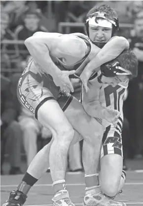  ??  ?? West Allis Hale’s Peyton Mocco (back) beat Waukesha West’s Shane Gantz for the 152-pound state title last season.