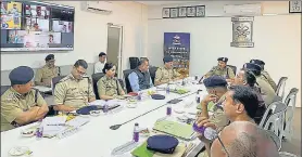  ?? HT PHOTO ?? Uttarakhan­d police chief Ashok Kumar chairs a meeting in Dehradun on Monday.