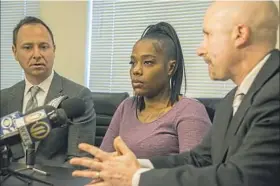  ?? Lake Fong/Post-Gazette ?? Attorneys George Kontos, left, and Ken Haber speak for their client Jade Martin, 34, at a news conference Monday. They filed a civil lawsuit against Pizza Milano former manager Mahmut Yilmaz for assaulting Ms. Martin.