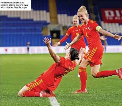  ?? ?? Helen Ward celebrates scoring Wales’ second goal with skipper Sophie Ingle