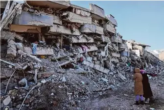  ?? Hussein Malla/Associated Press ?? With the hope of finding survivors fading, rescue teams searched Wednesday for signs of life in the rubble of thousands of buildings toppled by a catastroph­ic earthquake.