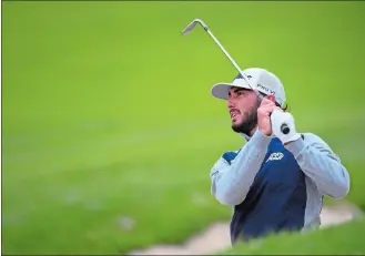  ?? NICK WASS/AP PHOTO ?? Max Homa hits from the bunker on the 14th hole during the final round of the Wells Fargo Championsh­ip on Sunday at TPC Potomac at Avenel Farm golf club in Potomac, Md.