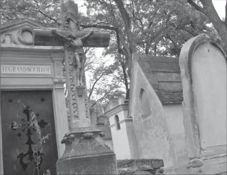  ?? THOMAS FROESE PHOTO ?? Some of the 70,000 tombstones at the Père Lachaise Cemetery in Paris are pictured here. Cemeteries are a vivid reminder of how death often brings clarity to life, writes columnist Thomas Froese, made all the more plain during the days of Halloween.