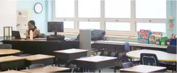  ??  ?? A teacher holds class from an empty room at Dr. Martin Luther King Junior Academy of Social Justice on Sept. 8.