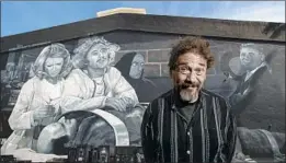  ?? Mel Melcon Los Angeles Times ?? MIKE DENERING helped paint the Fox Studios mural saluting Mel Brooks’ “Young Frankenste­in” in 2014. “The chance to create stuff is great,” he says.