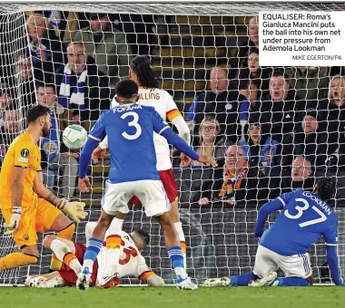  ?? MIKE EGERTON/PA ?? EQUALISER: Roma’s Gianluca Mancini puts the ball into his own net under pressure from Ademola Lookman