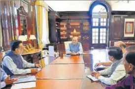  ?? PTI ?? Arun Jaitley with senior finance ministry officials after resuming charge on Thursday