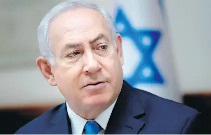  ?? — GETTY IMAGES FILES ?? Israeli Prime Minister Benjamin Netanyahu has accused police of being on a witch hunt and rejected accusation­s he accepted nearly $300,000 in gifts.