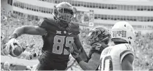  ?? THE OKLAHOMAN] ?? Oklahoma State's Jelani Woods (89) and Tylan Wallace (2) celebrate Woods' touchdown against Iowa State in October 2018. [SARAH PHIPPS/