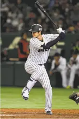  ?? Masterpres­s / Getty Images 2016 ?? As a right-handed pitcher, top, Shohei Ohtani, 23, is 42-15 with a 2.52 ERA in five seasons with the Japan Pacific League’s Nippon Ham Fighters. As a left-handed batter, he has hit .286 with a .500 slugging percentage and .859 OPS.