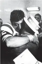  ?? AP ?? Quarterbac­k Joe Namath hugs his father after leading the Jets to the Super Bowl 3 title on Jan. 12, 1969.