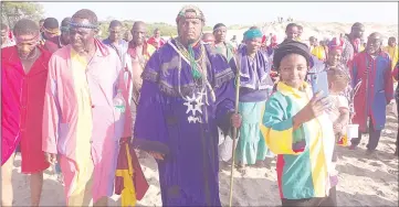  ?? ?? A congregant had the opportunit­y to take a selfie as she walks in front Melika Jericho Church in Zion’s Bishop Khanyakwez­we Vilakati ahead of the cleansing ceremony.