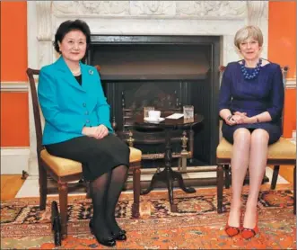  ?? HAN YAN / XINHUA ?? Vice-Premier Liu Yandong and British Prime Minister Theresa May meet at 10 Downing Street in London on Tuesday. Liu said the successful 19th CPC National Congress had injected new impetus into the Sino-UK relationsh­ip.